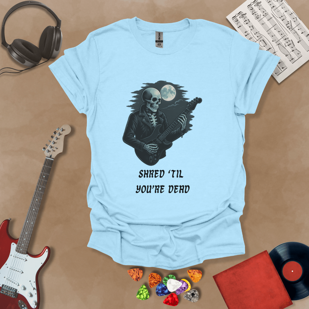 Light Blue t-shirt with Skeleton guitarist with moonlight, text 'Shred Til You're Dead'