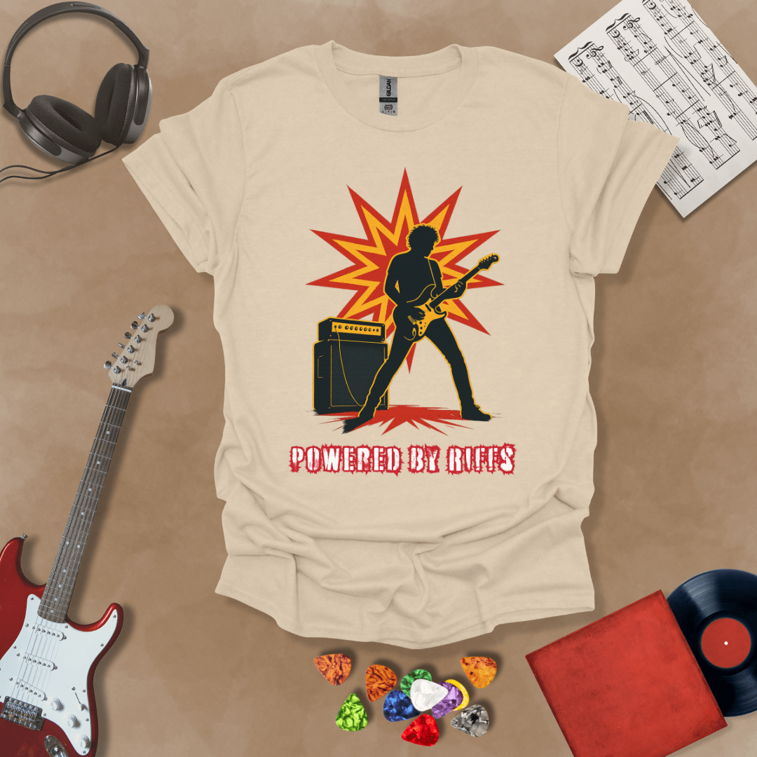 Beige t-shirt with Guitarist silhouette with amp and burst, text 'Powered by Riffs'