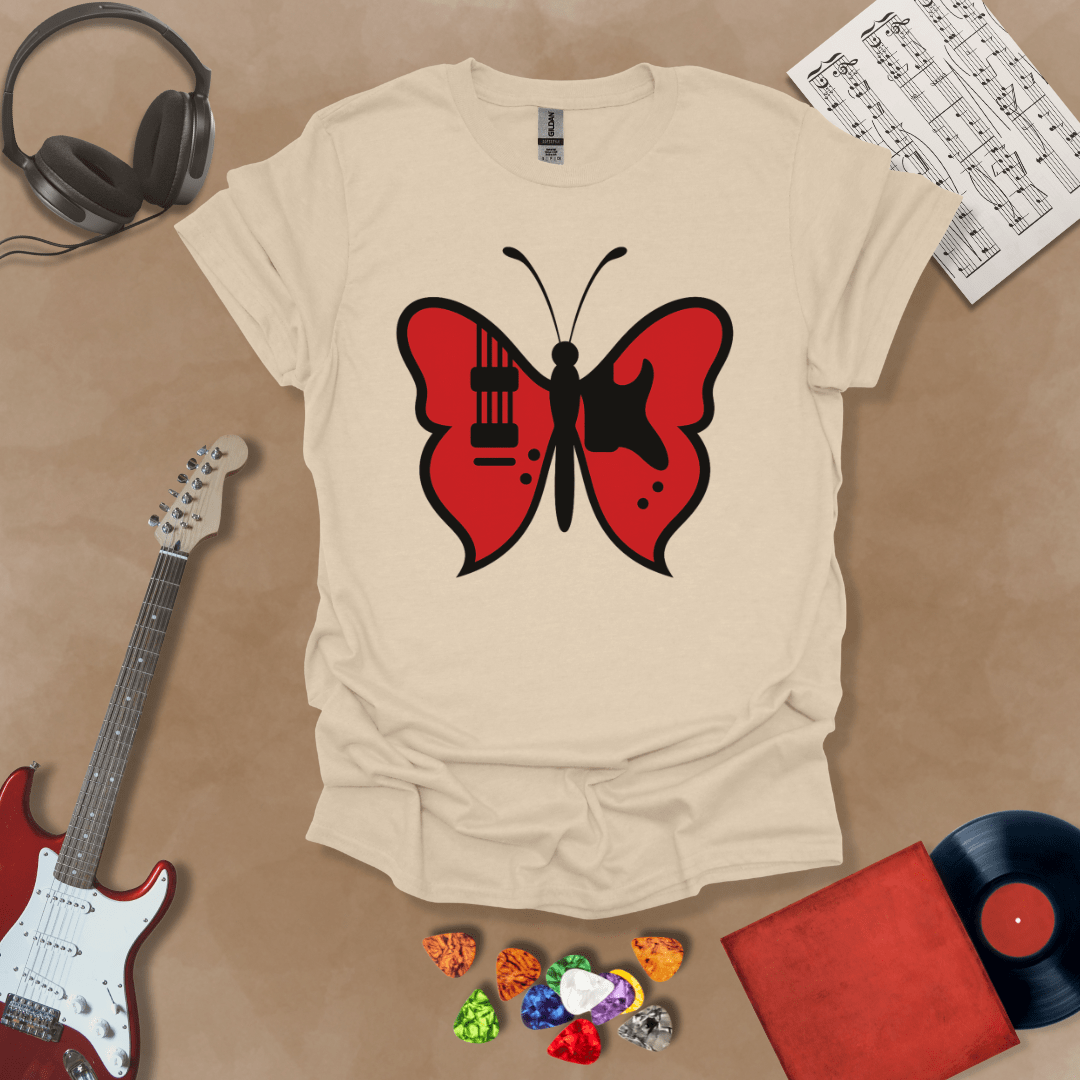 Beige t-shirt with guitar body sprouting butterfly wings.