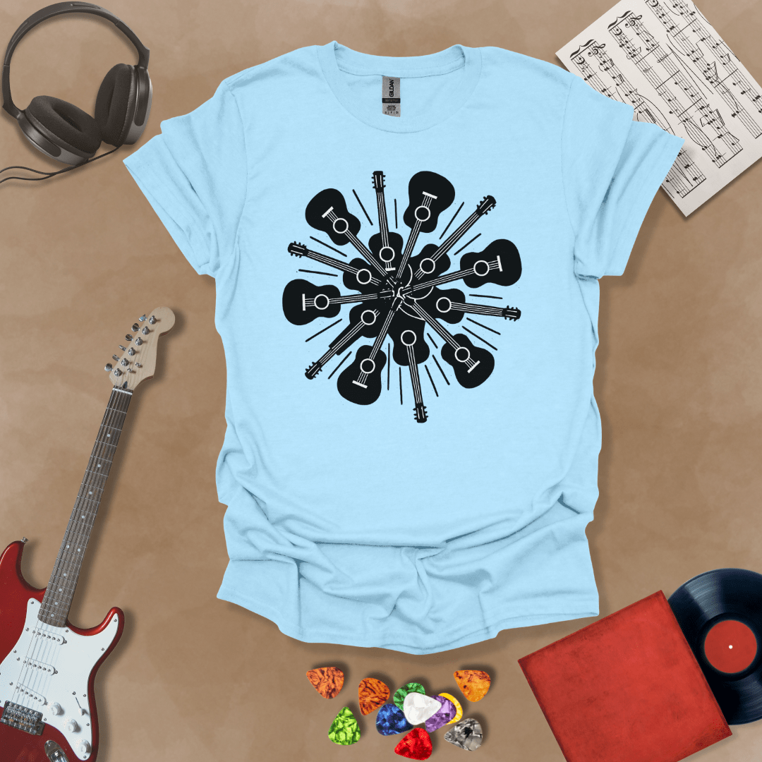 Light Blue t-shirt featuring a black and white burst of acoustic guitars arranged in a radial explosion pattern, creating a kaleidoscope effect.