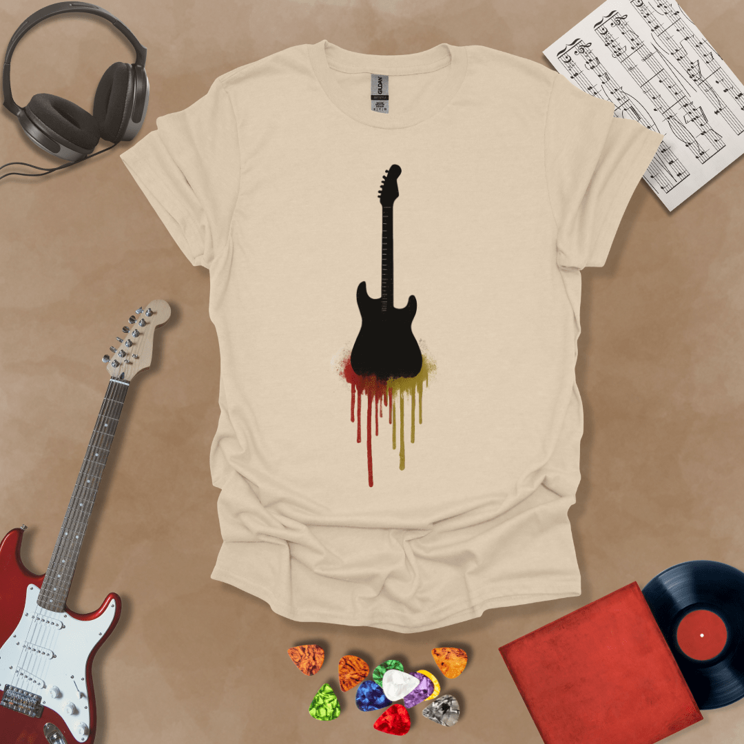 Beige t-shirt featuring a black electric guitar silhouette with colorful paint drips extending downward.