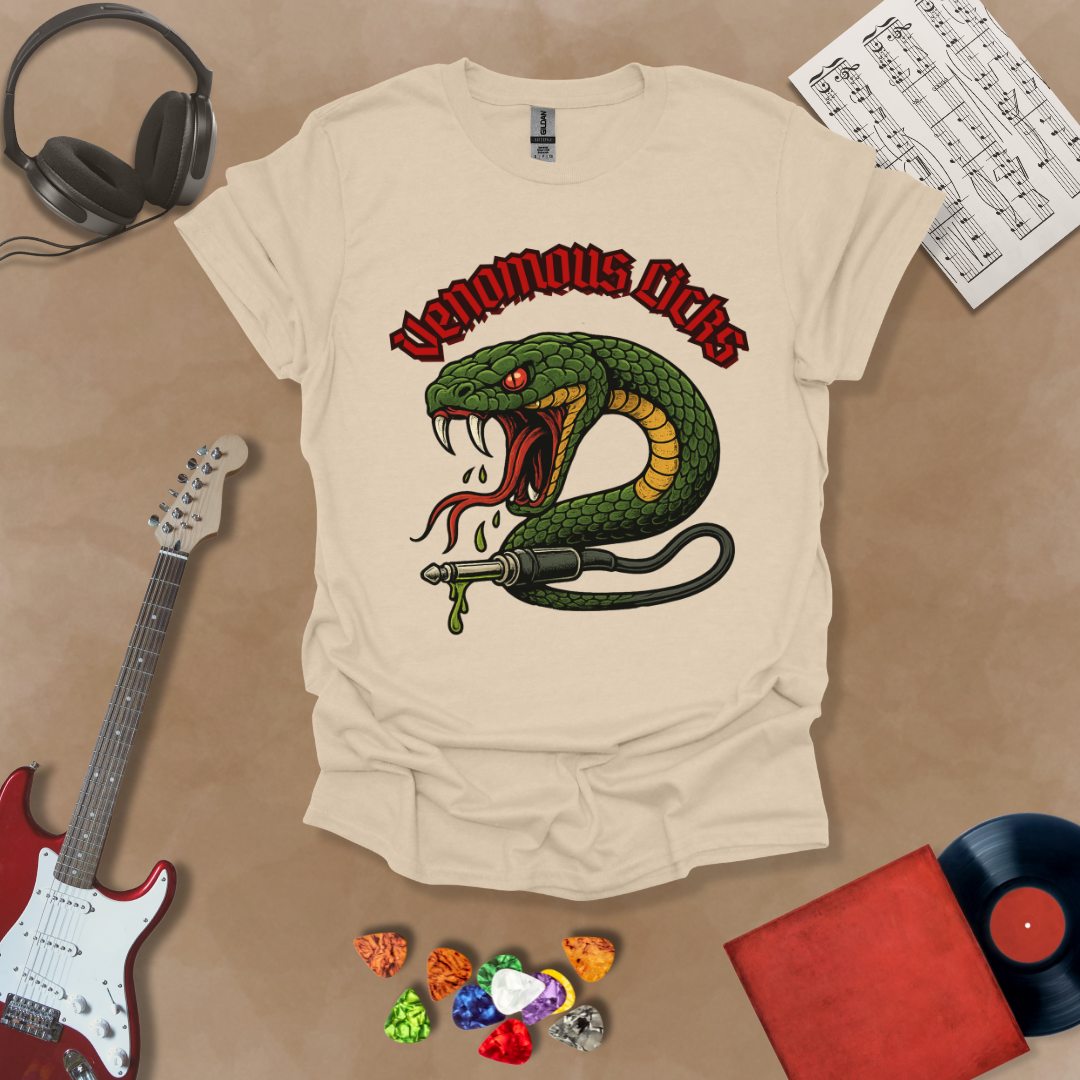 Beige t-shirt with graphic of Green snake striking with fangs bared, wrapped around a guitar cable plug, dripping venom, bold gothic red “Venomous Licks” text above.