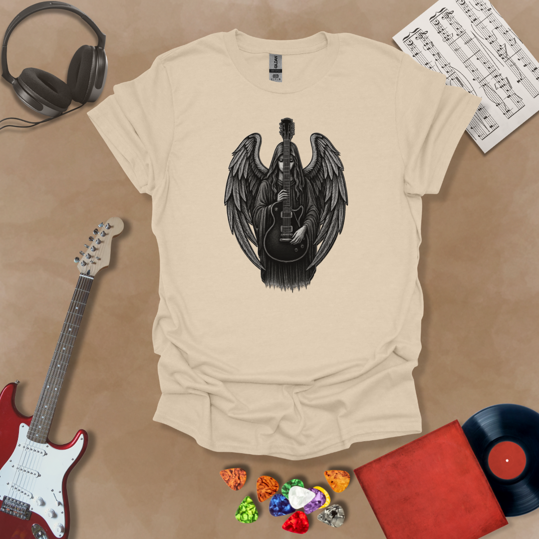 Beige t-shirt with Gothic angel holding a black electric guitar with detailed wings—moody rock art from the Fallen Angel: Legends Never Die (Reborn) design by Riff Junkie.#RiffJunkie