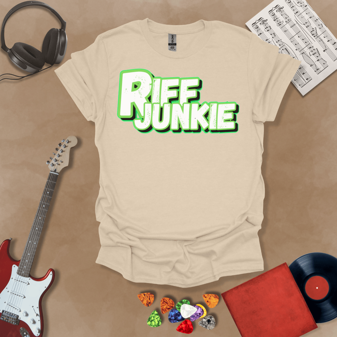 Beige T-shirt with Riff Junkie Logo in Light Glow Edition showing white and green outline logo with soft glow, perfect for light shirts and clean stage style.