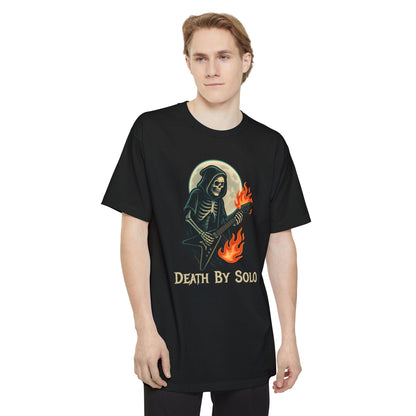 A man wearing a black short-sleeve t-shirt featuring a graphic of a grim reaper playing a guitar with flames, set against a full moon, with the text 'DEATH BY SOLO' printed below.