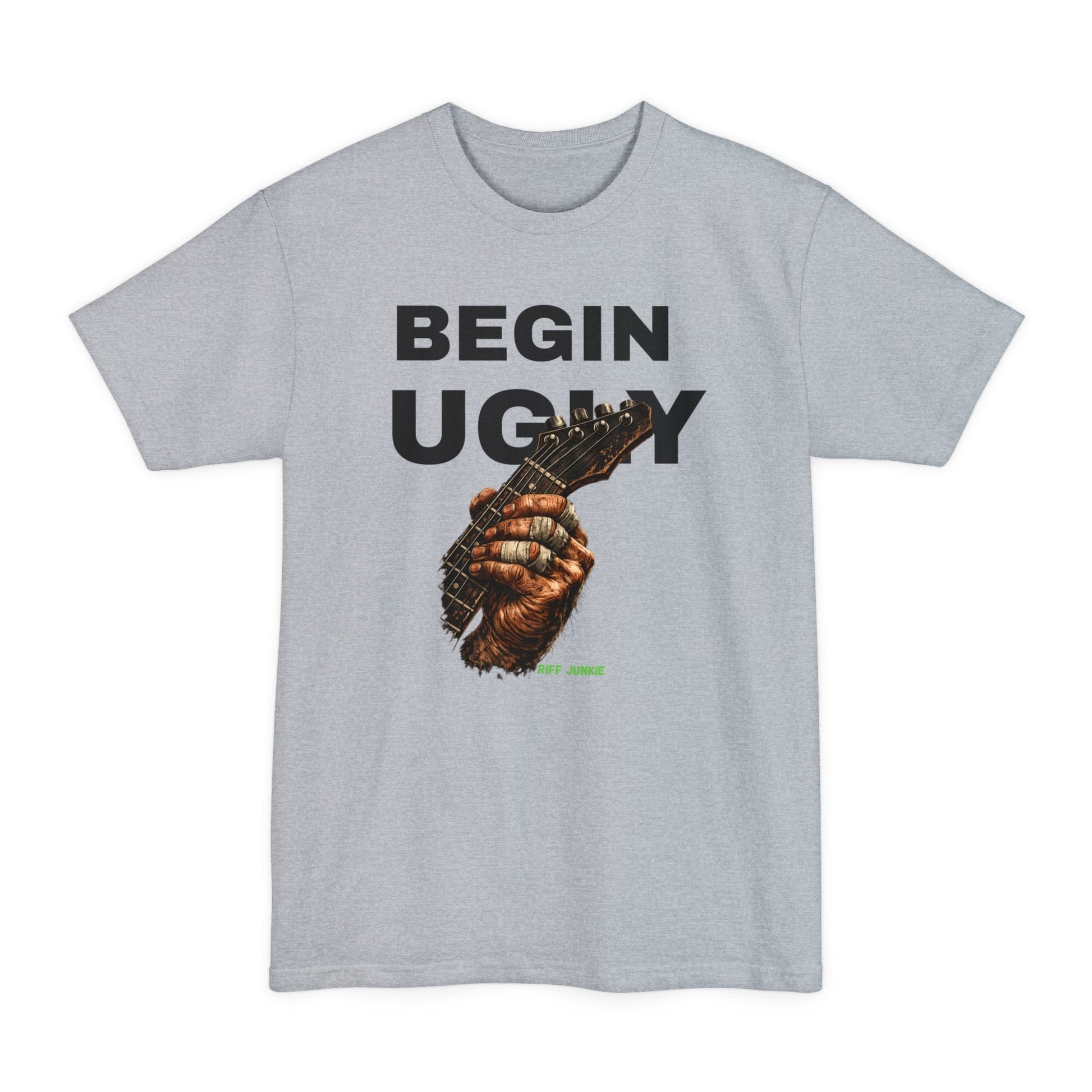A gray short-sleeve t-shirt featuring a graphic print on the front. The design displays the text 'BEGIN UGLY' in a distressed cream-colored font above an illustration of a hand holding a guitar, with  "Riff Junkie" in neon green.