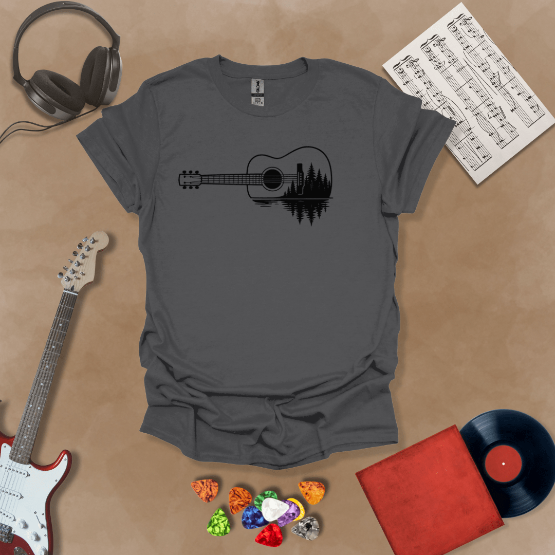 Charcoal t-shirt with a black graphic of an acoustic guitar, featuring a reflection of pine trees and water inside the guitar body.