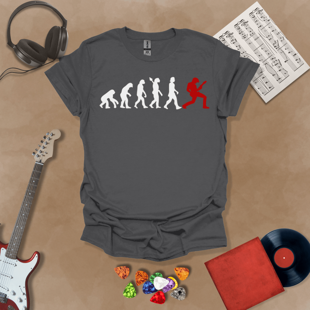 Charcoal Gray t-shirt with a white and red evolution graphic, showing the progression from ape to modern human, ending with a red silhouette of a guitarist rocking out.