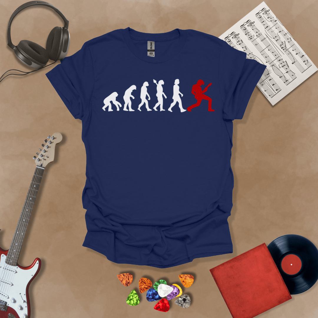 Navy t-shirt with a white and red evolution graphic, showing the progression from ape to modern human, ending with a red silhouette of a guitarist rocking out.