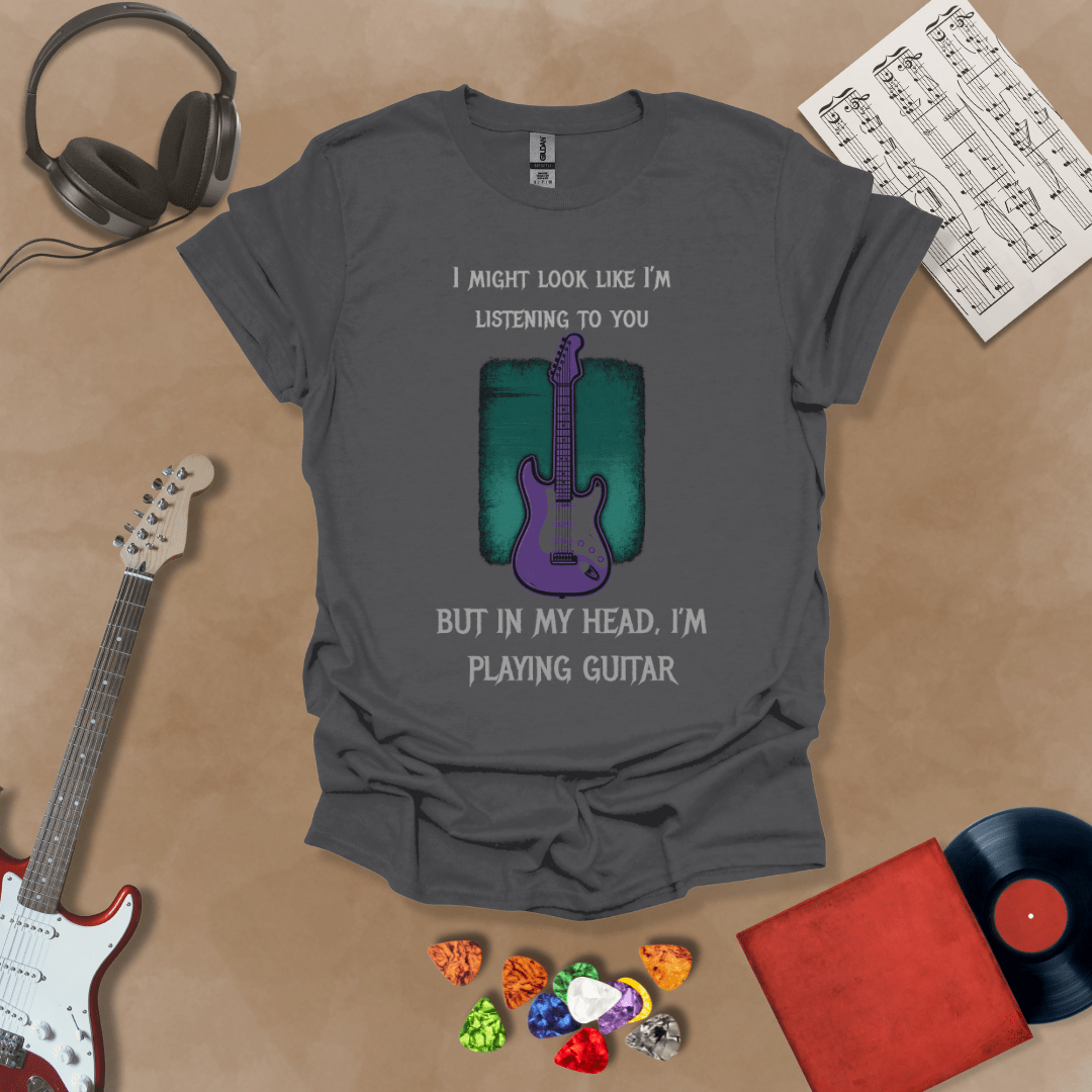 Purple electric guitar graphic with text about listening and playing guitar in head on Gray shirt by Riff Junkie.