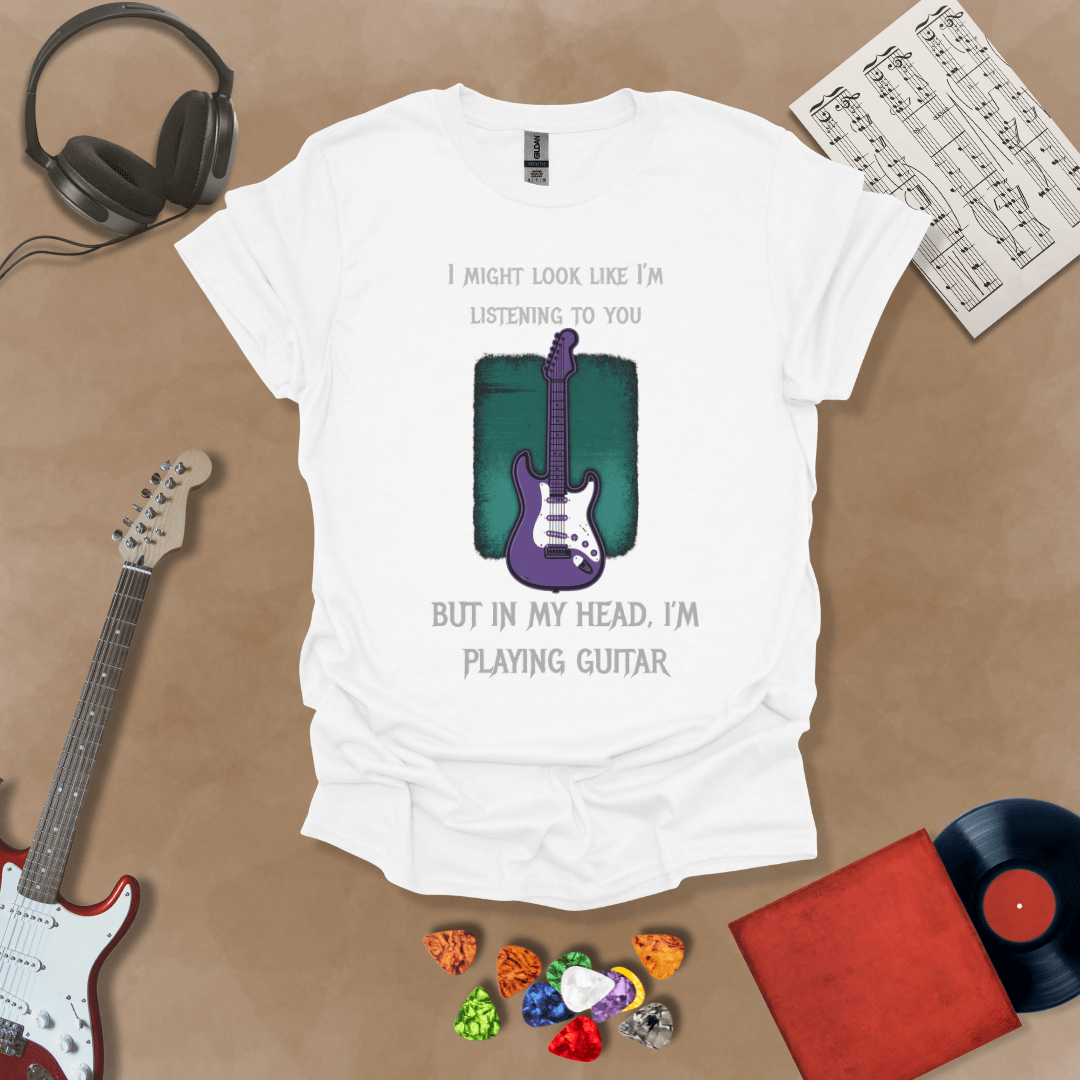 Purple electric guitar graphic with text about listening and playing guitar in head on White shirt by Riff Junkie.