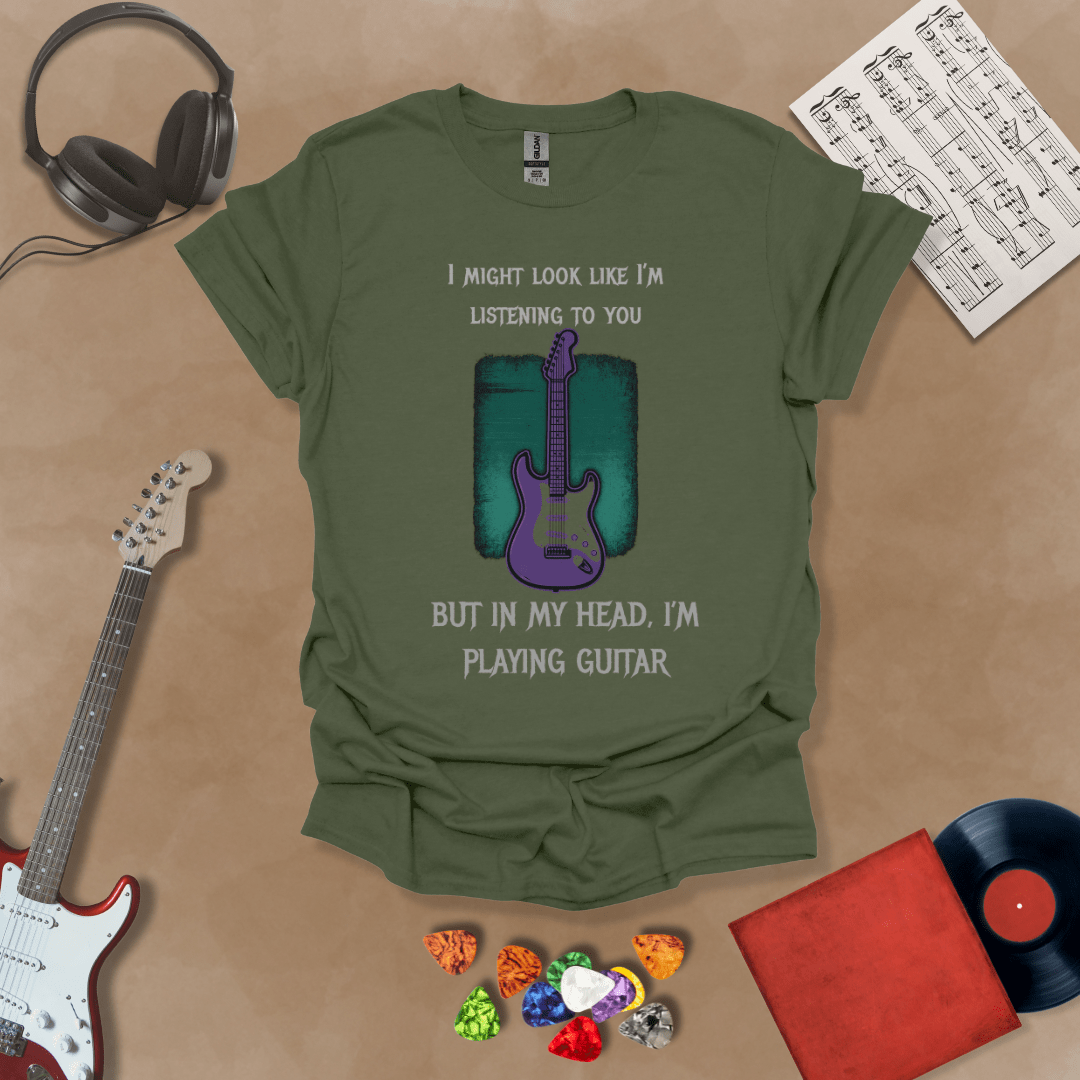 Vintage style guitar swirl on green shirt – psychedelic rock guitar t-shirt by Riff Junkie.