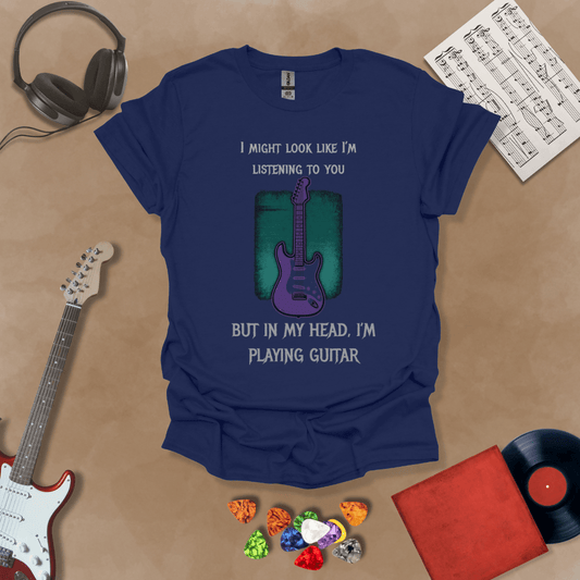 Purple electric guitar graphic with text about listening and playing guitar in head on Navy shirt by Riff Junkie.