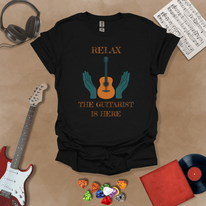 Black t-shirt with Acoustic guitar with hands and text 'Relax the guitarist is here'
