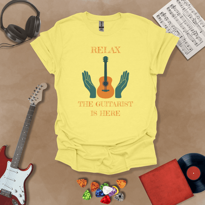 Yellow t-shirt with Acoustic guitar with hands and text 'Relax the guitarist is here'