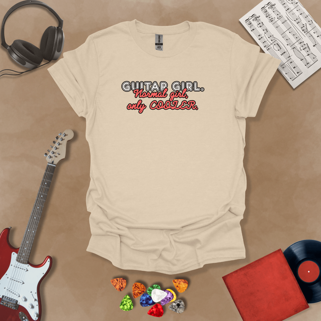 Beige t-shirt with Text 'Guitar Girl. Normal girl only cooler' bold retro style graphic