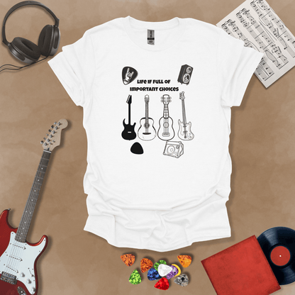 White t-shirt with Row of guitars and picks with text 'Life is full of important choices'