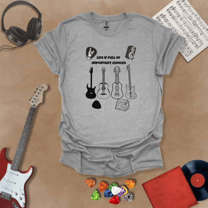 Gray t-shirt with Row of guitars and picks with text 'Life is full of important choices'