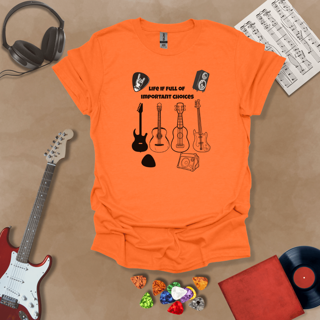 Orange  t-shirt with Row of guitars and picks with text 'Life is full of important choices'