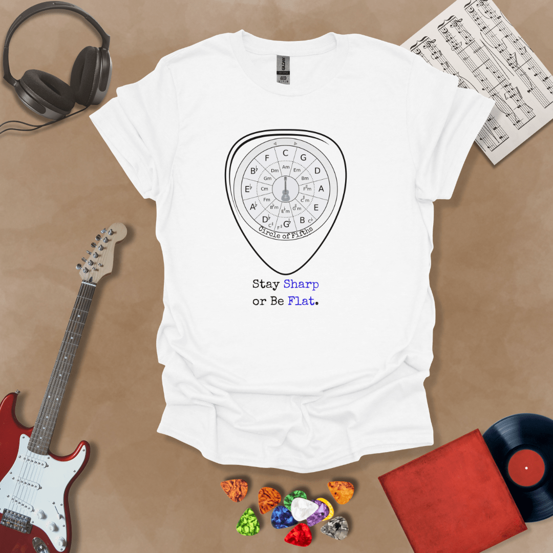 White t-shirt with Circle of fifths chart inside guitar pick, text 'Stay sharp or be flat'