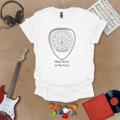 White t-shirt with Circle of fifths chart inside guitar pick, text 'Stay sharp or be flat'