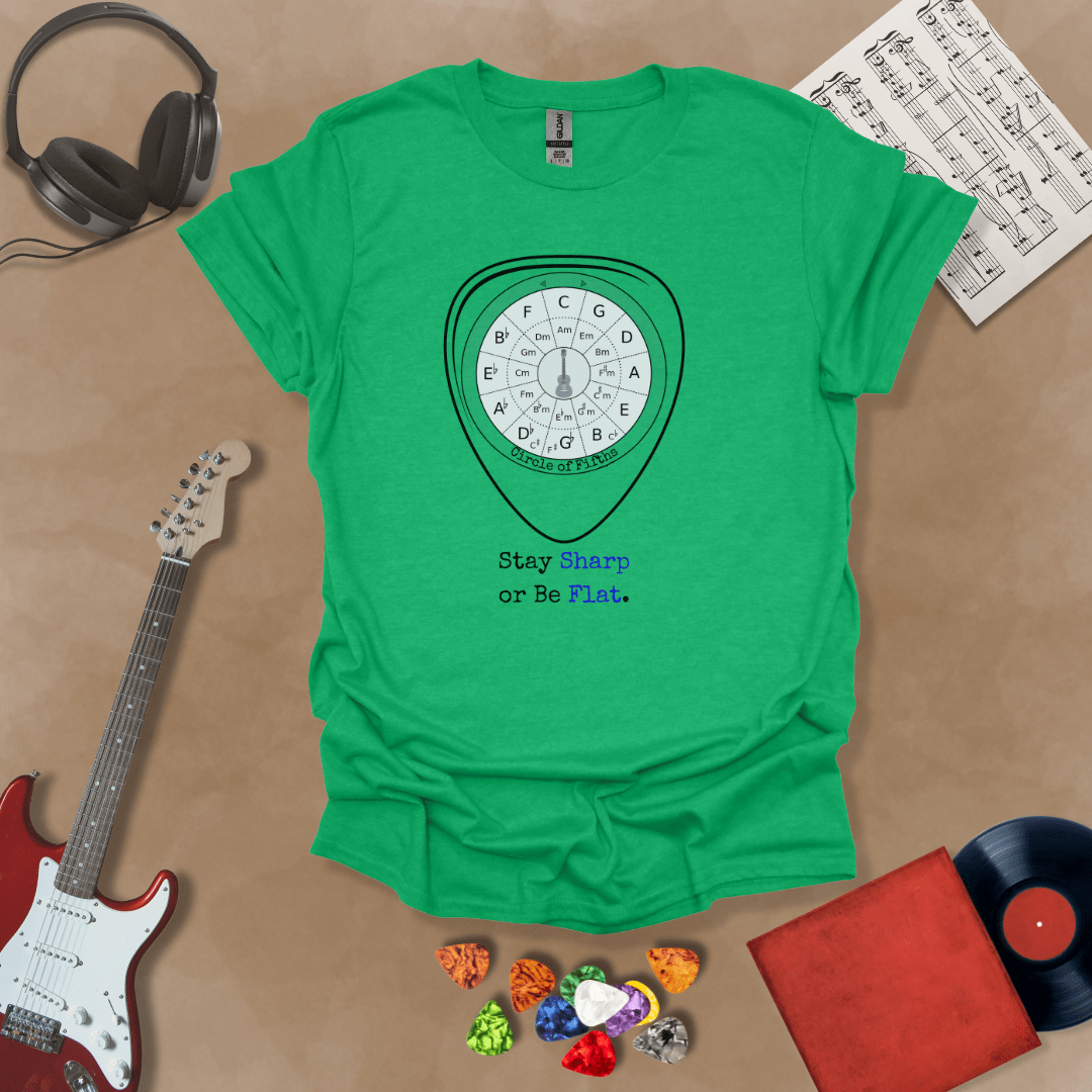 Green t-shirt with Circle of fifths chart inside guitar pick, text 'Stay sharp or be flat'