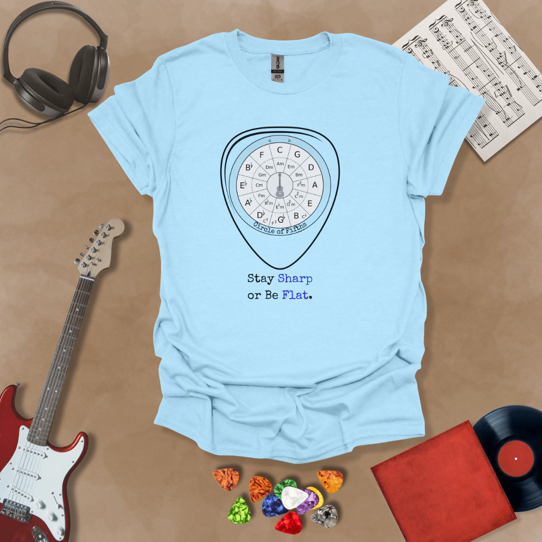 Light Blue t-shirt with Circle of fifths chart inside guitar pick, text 'Stay sharp or be flat'