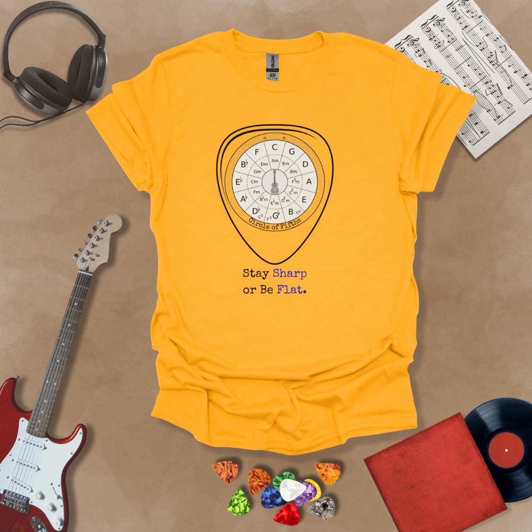 Yellow t-shirt with Circle of fifths chart inside guitar pick, text 'Stay sharp or be flat'