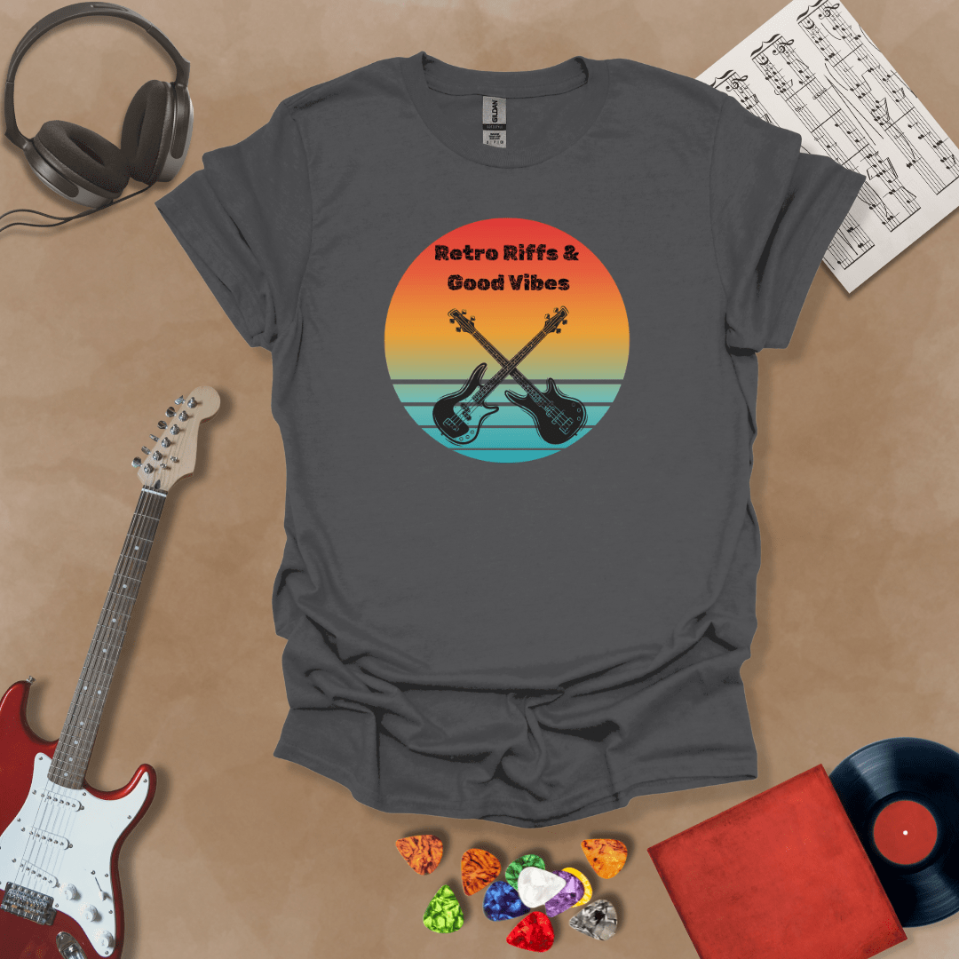 Gray t-shirt with Two guitars crossed in front of sunset, text 'Retro Riffs & Good Vibes'