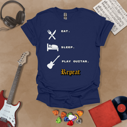 Blue t-shirt with 'Eat. Sleep. Play Guitar. Repeat.' text and graphics 