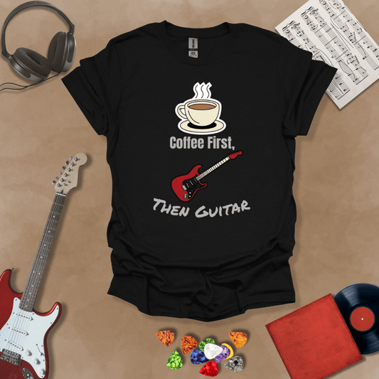 Black T-shirt design with steaming coffee cup illustration transforming into guitar strings, text “Coffee First, Then Guitar.”
