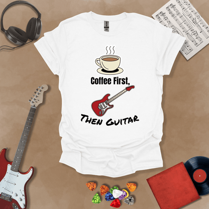 White T-shirt design with steaming coffee cup illustration transforming into guitar strings, text “Coffee First, Then Guitar.”