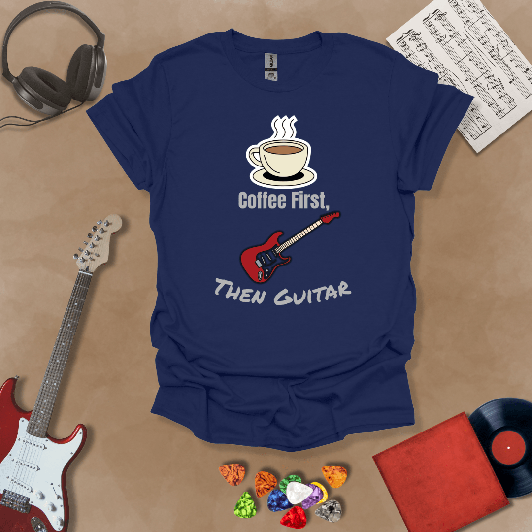 Blue T-shirt design with steaming coffee cup illustration transforming into guitar strings, text “Coffee First, Then Guitar.”