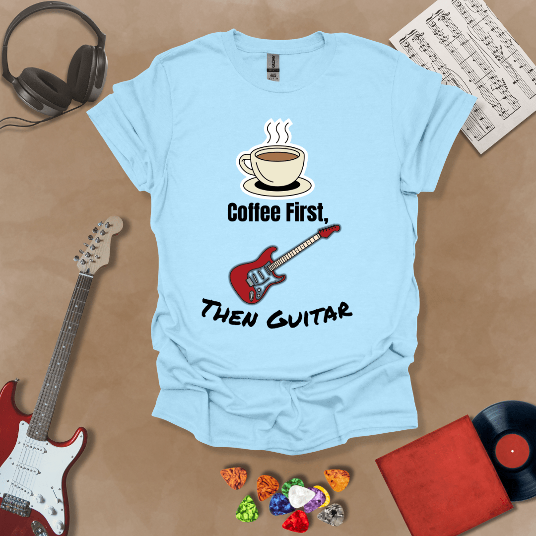 Light Blue T-shirt design with steaming coffee cup illustration transforming into guitar strings, text “Coffee First, Then Guitar.”