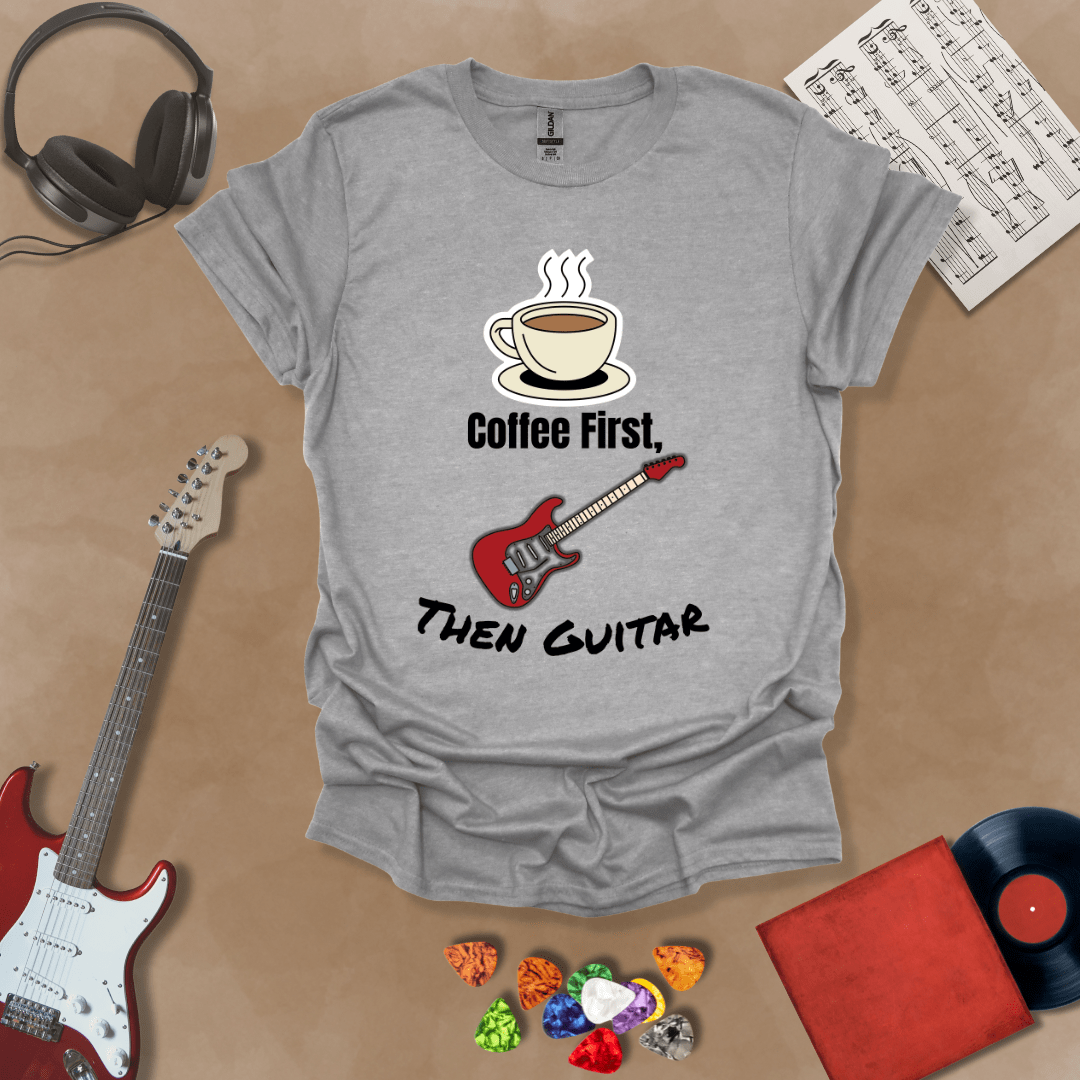 Gray T-shirt design with steaming coffee cup illustration transforming into guitar strings, text “Coffee First, Then Guitar.”