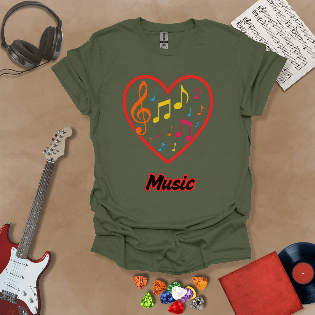Green  t-shirt with red heart outline filled with colorful music notes and treble clef, “Music” text below.