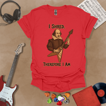 Medieval-inspired red t-shirt with bold lettering “I Shred, Therefore I Am” and guitar art.
