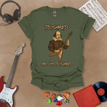 Green Shakespeare-inspired t-shirt design with text “To Shred or Not to Shred,” paired with guitar artwork.
