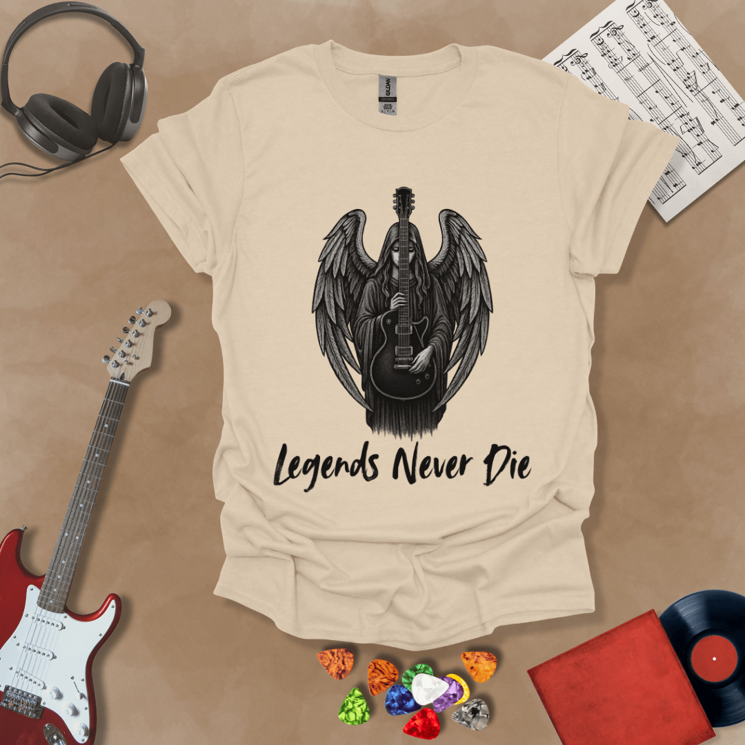 Beige t-shirt with black illustration of angel with wings holding an electric guitar, text “Legends Never Die.”