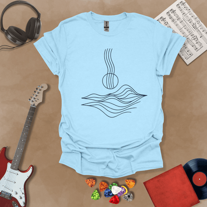 Blue t-shirt with minimalist abstract line art resembling guitar strings flowing into wave-like shapes.