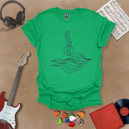 Green t-shirt with minimalist abstract line art resembling guitar strings flowing into wave-like shapes.