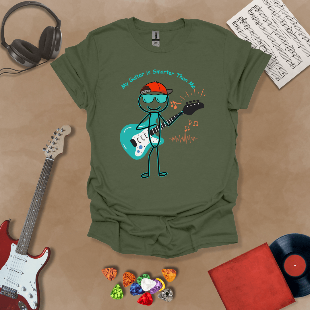 Green t-shirt with cartoon stick figure wearing hat and sunglasses, holding teal guitar, text “My Guitar is Smarter Than Me.”
