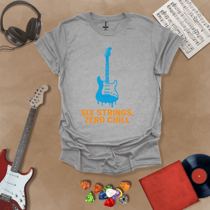 Gray t-shirt with dripping blue electric guitar graphic, text “Six Strings, Zero Chill.”
