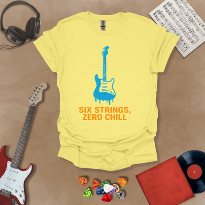 Yellow t-shirt with dripping blue electric guitar graphic, text “Six Strings, Zero Chill.”
