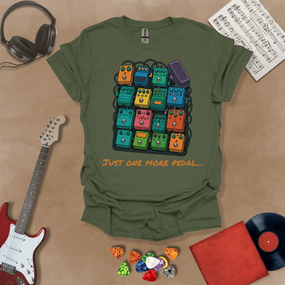 Green t-shirt with graphic of multiple guitar pedals, text “Just One More Pedal.”