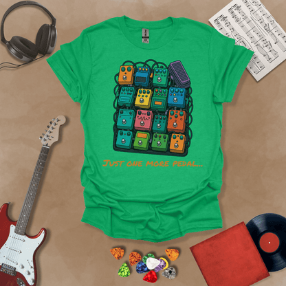 Green t-shirt with graphic of multiple guitar pedals, text “Just One More Pedal.”