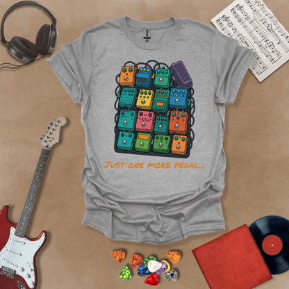Gray t-shirt with graphic of multiple guitar pedals, text “Just One More Pedal.”