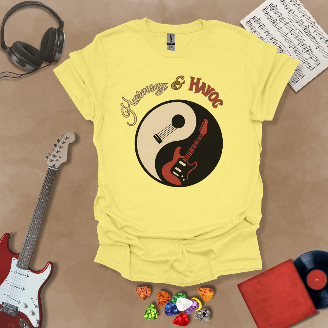 Yellow t-shirt with yin-yang design made from an acoustic and electric guitar, text “Harmony & Havoc.”