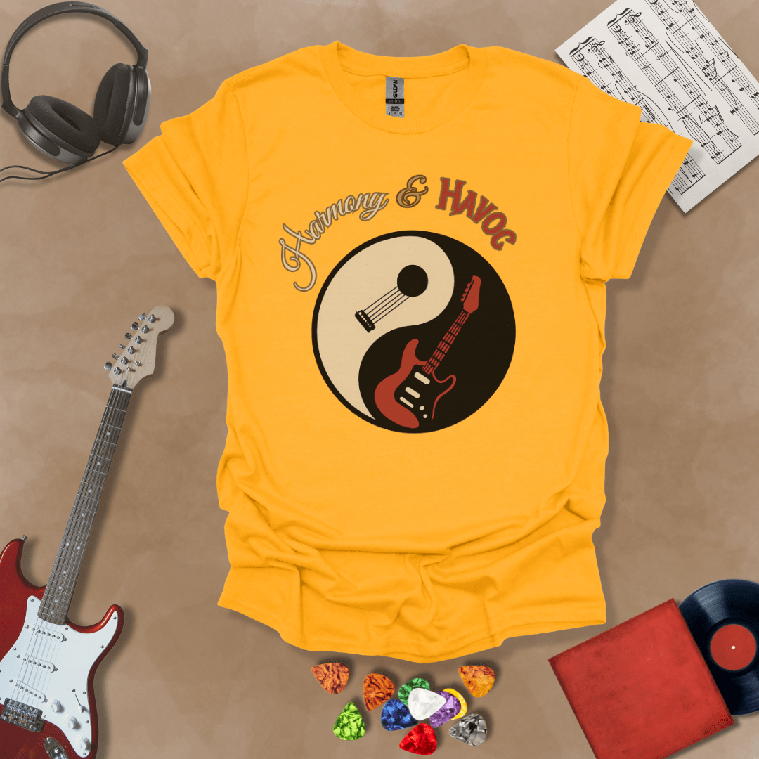 Yellow t-shirt with yin-yang design made from an acoustic and electric guitar, text “Harmony & Havoc.”