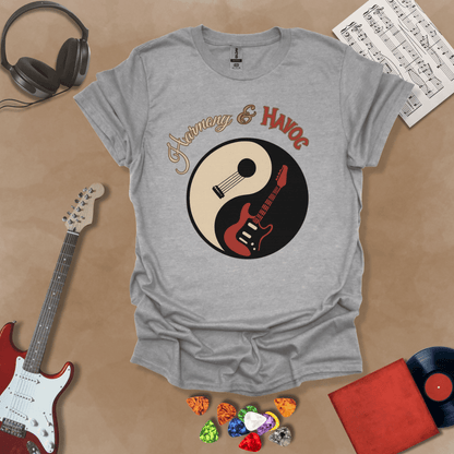 Gray t-shirt with yin-yang design made from an acoustic and electric guitar, text “Harmony & Havoc.”